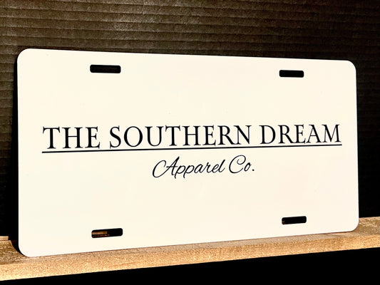 White and Black License Plate Tag
